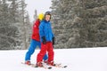 Two boys enjoying winter ski vacation Royalty Free Stock Photo