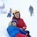 Two boys enjoying winter ski vacation Royalty Free Stock Photo