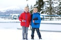 Two boys enjoying winter ski vacation Royalty Free Stock Photo