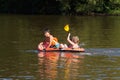 Two Boys Having Fun on Inflatable Rubber Boat Royalty Free Stock Photo