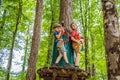 Two boys in a helmet, healthy teenager school boy enjoying activity in a climbing adventure park on a summer day Royalty Free Stock Photo