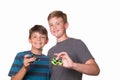 Two boys holding fidget spinners