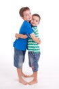 Two boys hugging