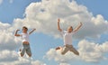 Two boys jumping