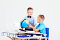 Two boys are learning globe for desk at school Royalty Free Stock Photo