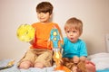 Two boys play astronauts and rocker liftoff Royalty Free Stock Photo