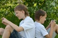 Two boys play on phone Royalty Free Stock Photo