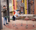 Two boys on a playground outdoors in a park Royalty Free Stock Photo