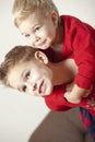 Two boys playing and embracing Royalty Free Stock Photo
