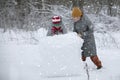 Two boys are playing in the snow Royalty Free Stock Photo