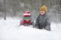 Two boys are playing in the snow Royalty Free Stock Photo