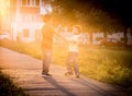 Two boys playing together on street Royalty Free Stock Photo