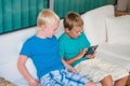 Two boys playing on touchscreen tablet computer Royalty Free Stock Photo