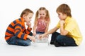 Two boys and pretty girl playing chess Royalty Free Stock Photo