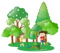 Two boys raking leaves in forest