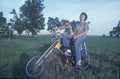 Two boys sitting on their bikes