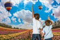 Two boys standing on a field Royalty Free Stock Photo