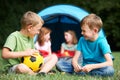 Two Boys Talking On Camping Trip Royalty Free Stock Photo