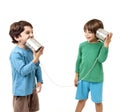 Two boys talking on a tin can phone Royalty Free Stock Photo