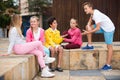 Two boys and three girls are talking about play on walk Royalty Free Stock Photo