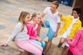 Two boys and three girls are talking about play on walk Royalty Free Stock Photo