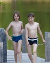 Two Boys Walking on Jetty