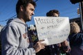 Two boys who are part Middle Eastern and part American hold sign saying Don`t send me to kill my own peopl Royalty Free Stock Photo