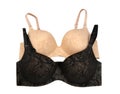 Two bra beige and black. Isolate on white Royalty Free Stock Photo