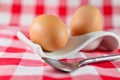 two eggs and spoon Royalty Free Stock Photo