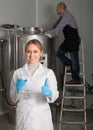 Two brewery workers on beer factory Royalty Free Stock Photo