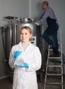 Two brewery workers on beer factory Royalty Free Stock Photo