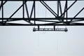 Two bridge workers silhouetted under deck slab Royalty Free Stock Photo