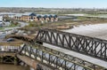 Old bridge over river Thames at port of London in Tilbury, UK. Royalty Free Stock Photo