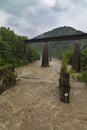 Two bridges over a stormy mountain river Royalty Free Stock Photo