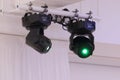 Two bright illuminators devices rays of green light Royalty Free Stock Photo