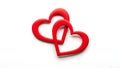 Two interlocking red hearts on a white background love romance Royalty Free Stock Photo