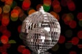 Two brilliant mirror Christmas ball, on dark shimmering background