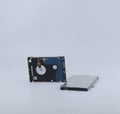 two broken laptop hard drives isolated on a white background Royalty Free Stock Photo