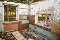 Two broken windows in an abandoned house Royalty Free Stock Photo