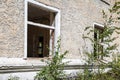 Two broken windows in an abandoned house Royalty Free Stock Photo