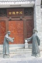 Two bronze statues of officials in the Qing Dynasty