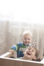 Two brothers play with each other Royalty Free Stock Photo