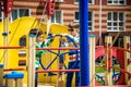 Two brothers sibling boy as a captain or sailors play on the ship outdoors on sunny day. Kids has a lot of fun. Ship has colorful Royalty Free Stock Photo