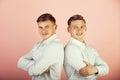 Two brothers smiling on pink background Royalty Free Stock Photo