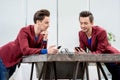 Two brothers twins working at the office Royalty Free Stock Photo