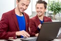 Two brothers twins working at the office Royalty Free Stock Photo