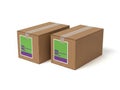 Two brown cardboard boxes with green and purple labels placed side by side on white background Royalty Free Stock Photo