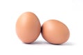 Two brown chicken eggs isolated against white. Royalty Free Stock Photo