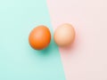 Two brown eggs sit next to each other on a white background Royalty Free Stock Photo