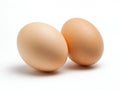 Two brown eggs sit next to each other on a white background Royalty Free Stock Photo